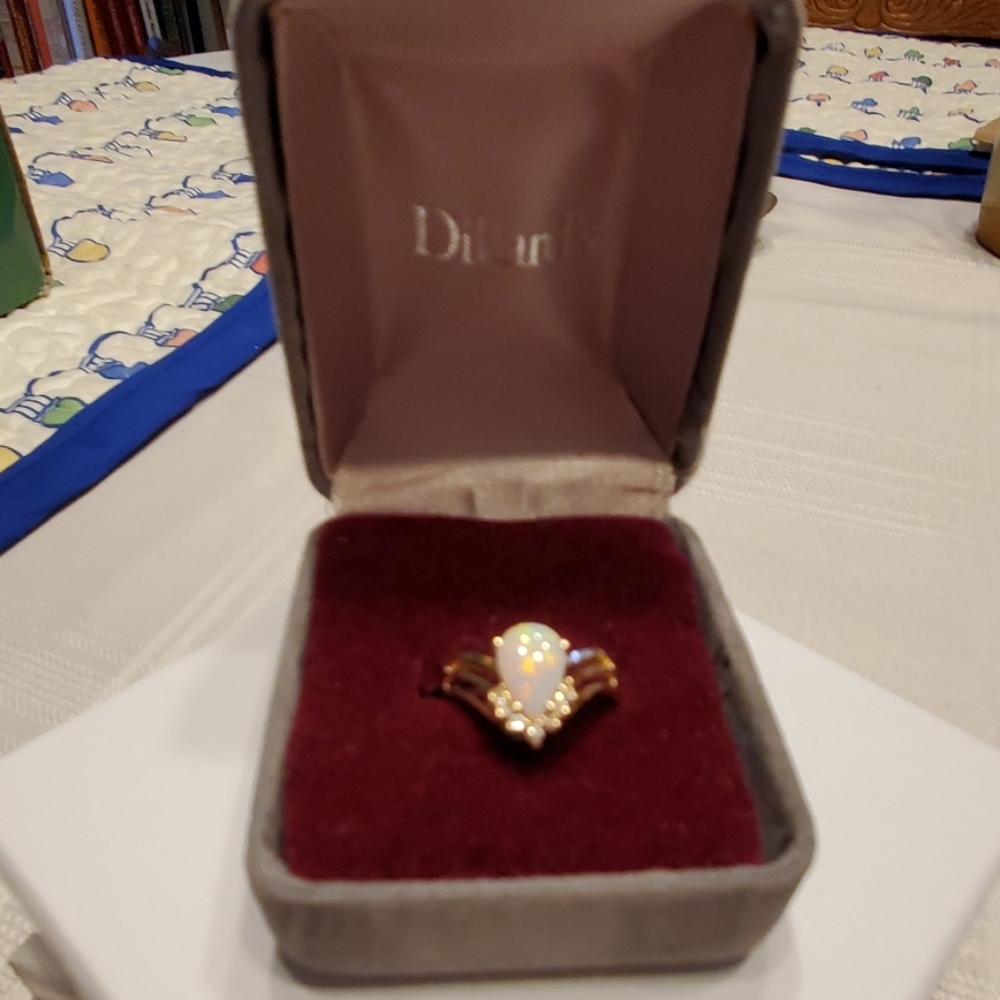 Opal ring with small diamond accent 10 K gold